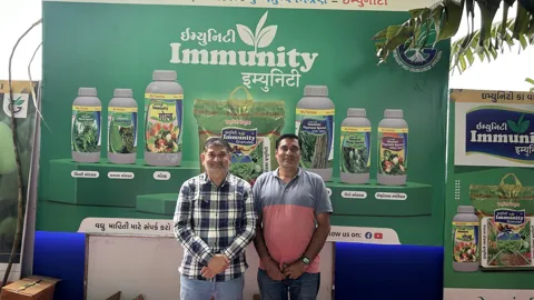 Farmers at the Immunity stall at a farmer fair