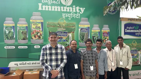 Farmers at the Immunity stall at a farmer fair